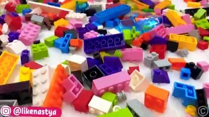 Nastya and dad are playing with Legos. Video for children