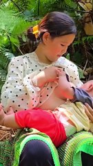 Mom Breastfeeding to her child