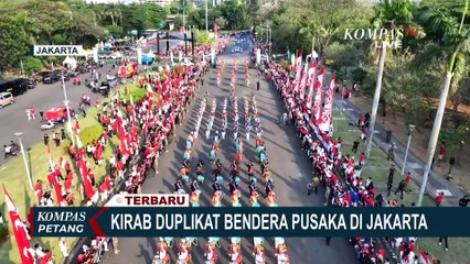 Download Video: Antusiasme Warga Jakarta Saksikan Kirab Pengembalian Dupliklat Bendera Pusaka di Monas