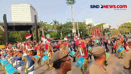 Kirab Pengembalian Bendera Merah Putih dan Teks Proklamasi disambut Antusias Warga di Kawasan Monas