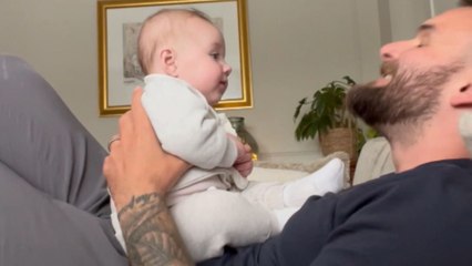 Dad's funny reenactment of monkey sounds gives baby daughter her 1st big belly laugh!