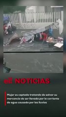 Mujer es captada tratando de rescatar su mercancía que era arrastrada por la corriente que se formó por las #Lluvias  intensas que azotaron a  #monterrey