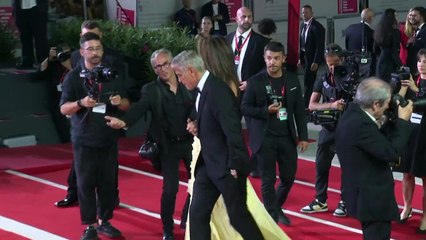 George and Amal Clooney hit the red carpet in Venice