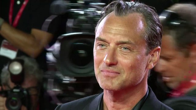 Jude Law walks the red carpet as 'The Order' premieres in Venice
