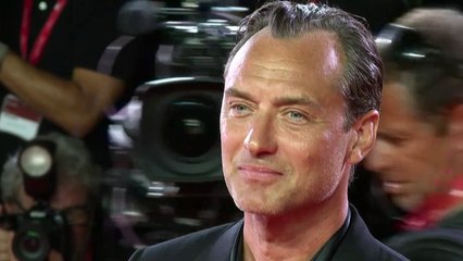 Jude Law walks the red carpet as 'The Order' premieres in Venice