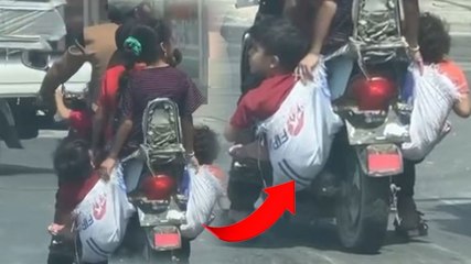 6 kişinin bindiği motosiklette çocuklar çuvalla taşındı