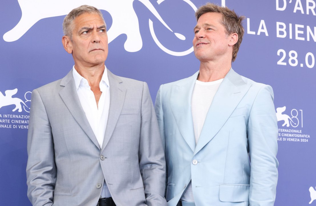 George Clooney was paid “millions and millions and millions of dollars less” than it was reported for his role in ‘Wolfs’