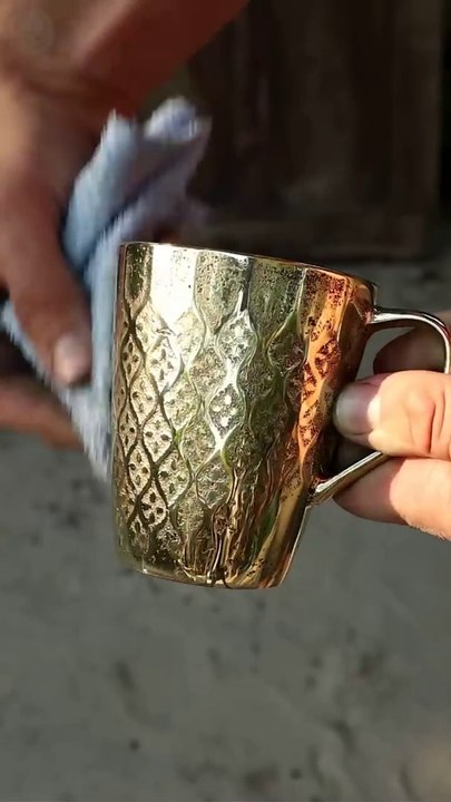 Casting Molten Scrap into Conical Mug