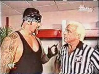 The Undertaker intimidates Ric Flair