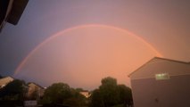 Ramsey, MN: Ethereal double rainbow and lightning bolts coexist in the sky