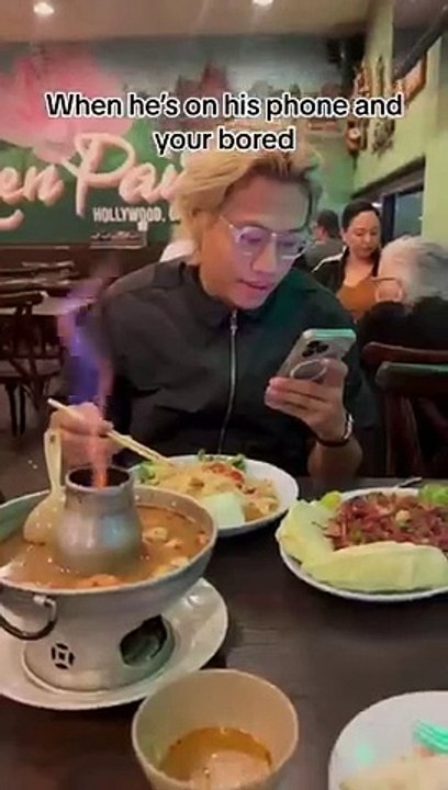 When a boy is on his phone while feeling bored