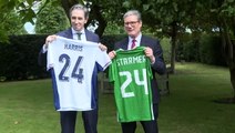 Keir Starmer and Simon Harris trade names on football shirts ahead of England v Ireland