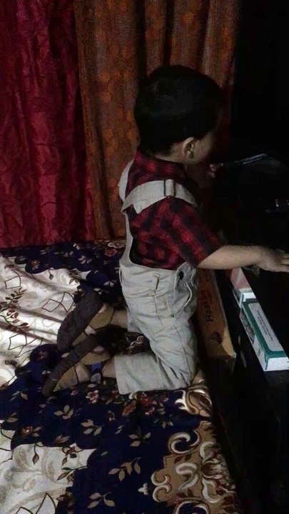 kid trying to start a TV