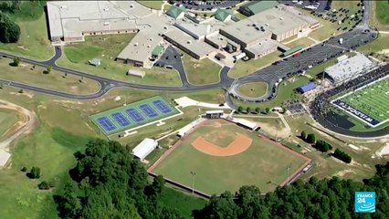 Georgia arrests father of teen suspected of killing four at school