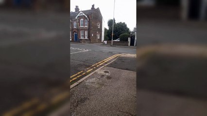 Clanging manhole cover in Gravesend