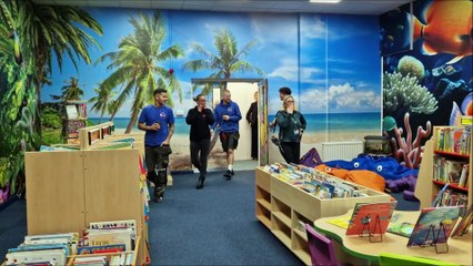 Thomas A Becket Infant School in Worthing reveals its new school library and author John Bond cuts the ribbon