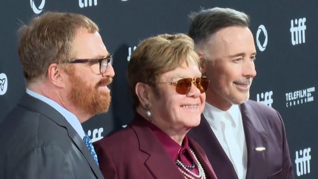 Elton John smiles in first public appearance since suffering ‘severe infection’