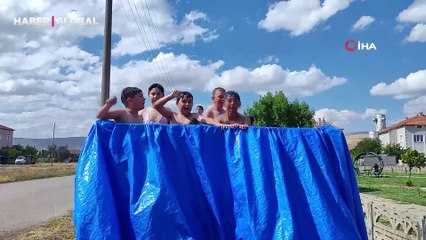 Kamyon kasasını havuza çevirdi: "Her şey çocuklar gülsün diye"