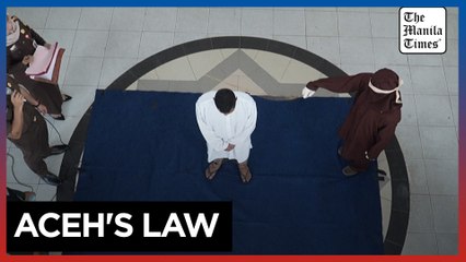 Two men publicly flogged in Indonesia for gay sex