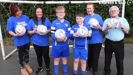 Two pupils from Landywood Primary School, Great Wyrley raise money for new goalposts