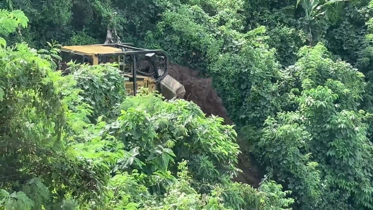 D6R XL Bulldozer Action Conquers the Mountain Slope for a New Road