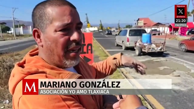 Vecinos de San Agustín Tlaxica reparan baches en la carretera México-Laredo