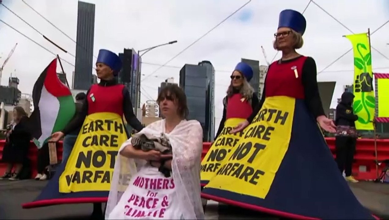 Victorian premier defends Land Forces expo as police charge woman on third day of Melbourne protest