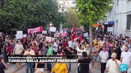 Thousands rally in Tunisia as president cracks down on opponents ahead of election