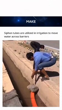 Read captions for more details . A siphon tube works by using gravity and atmospheric pressure to move water from a higher point to a lower point, even if it needs to go over a barrier in the process. To start, the t