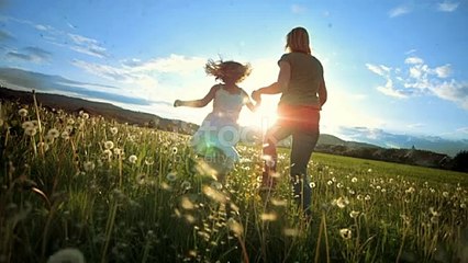 Super Slow Motion shot of a mother and her little daughter