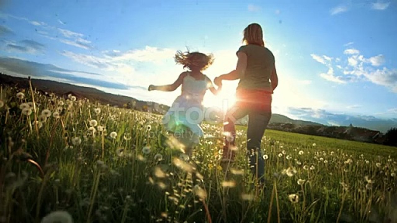 Super Slow Motion shot of a mother and her little daughter