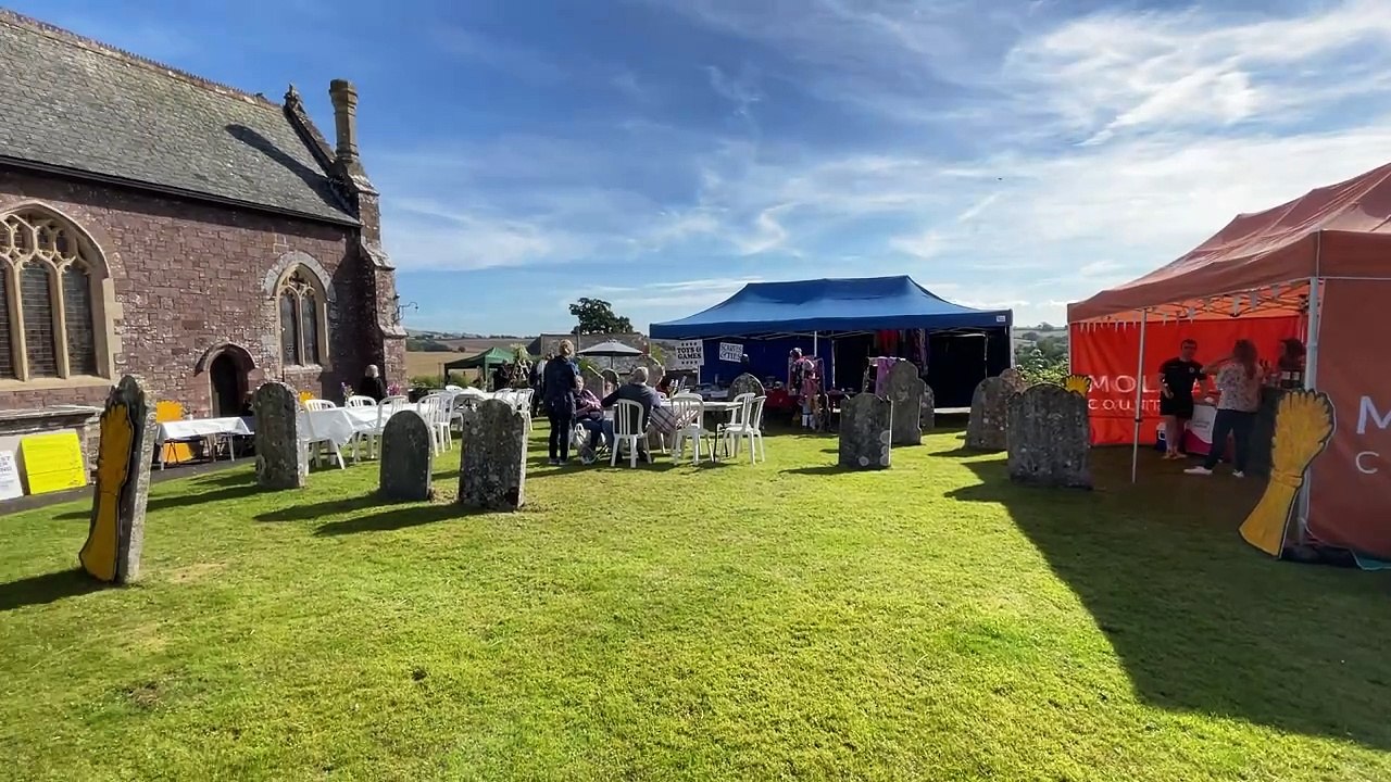 Outside St Swithun's Church during harvest event (Will Goddard, Crediton Courier)