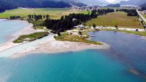 Drone view - House, trees and beach