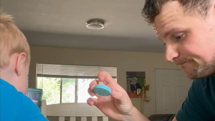 Competitive toddler disrupts dad's tower building fun with toy car rampage