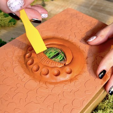 She altered a book's cover into a unique mythical dragon!