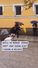 Watch the moment woman is swept away by floods in Moldova