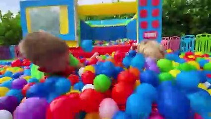 Chris and Michael pretend play with toy microwave