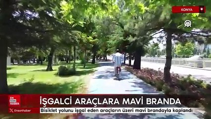 Konya'da bisiklet yolunu işgal eden araçların üzeri mavi brandayla kaplandı