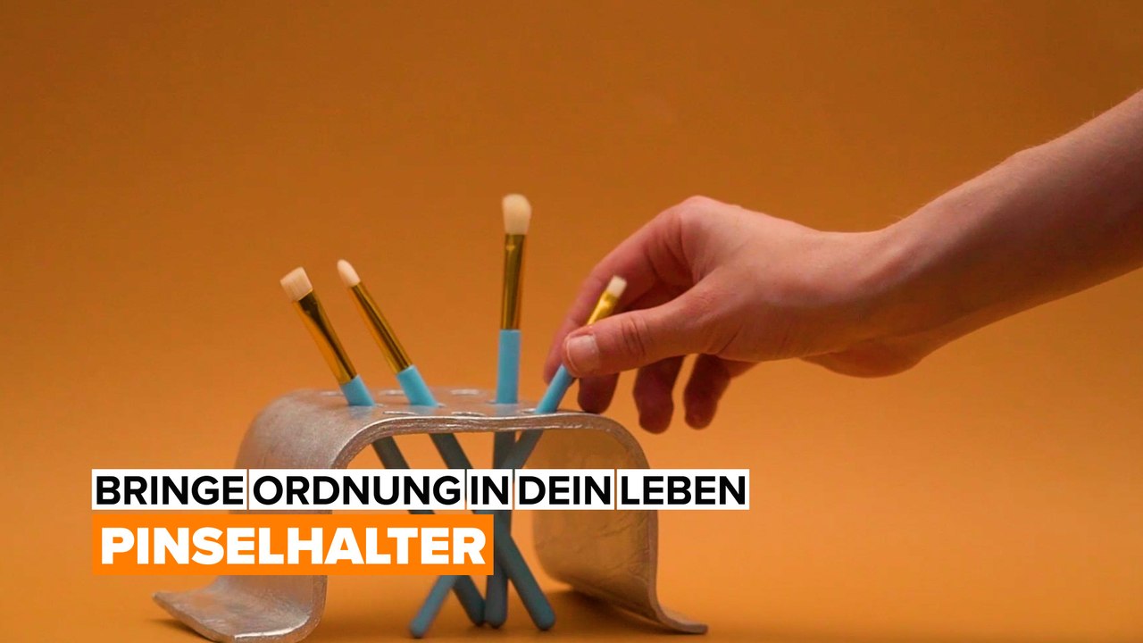 Bringe ordnung in dein leben: pinsel in den pinselhalter!