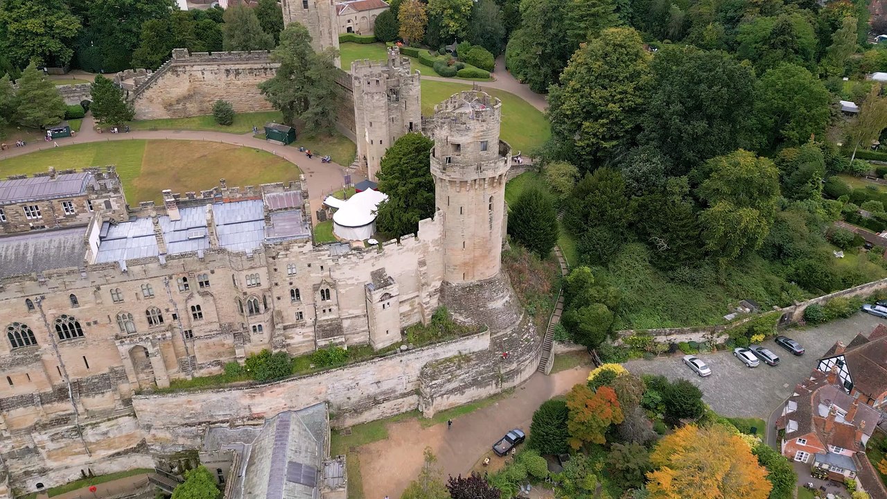 Daredevil cleaners abseil 100-foot walls of Warwick Castle’s Caesar's Tower,