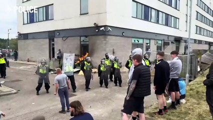 Shocking footage at Rotherham riots shows Mason Reddy with toddler in arms