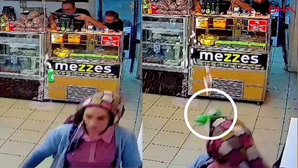 Bolu'da ilginç olay kamerada: Yere düşen maden suyu şişesi kafasına çarptı