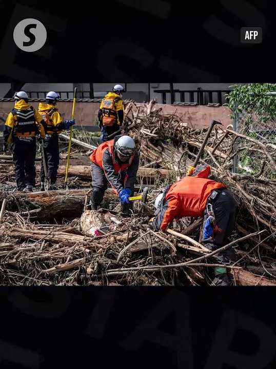 Rescuers comb muddy riverbanks after Japan floods kill six