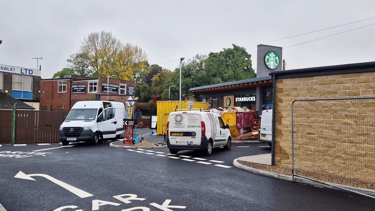Video shows progress on drive through Starbucks, with opening date announced
