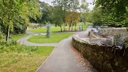 Trees and the Crana River along a peaceful Swan Park in Buncrana, Co.Donegal
