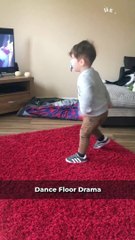 Toddler's Joyful Dance Cut Short by Unexpected Furry Interruption!
