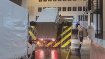 Ramp onto Calais ferry rises in air with lorry on top