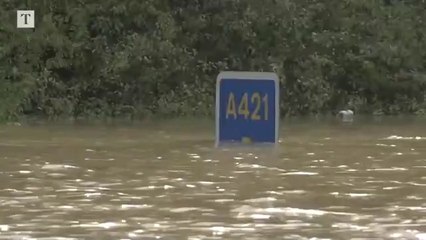 Flooding swamps UK as month’s worth of rain falls in a day