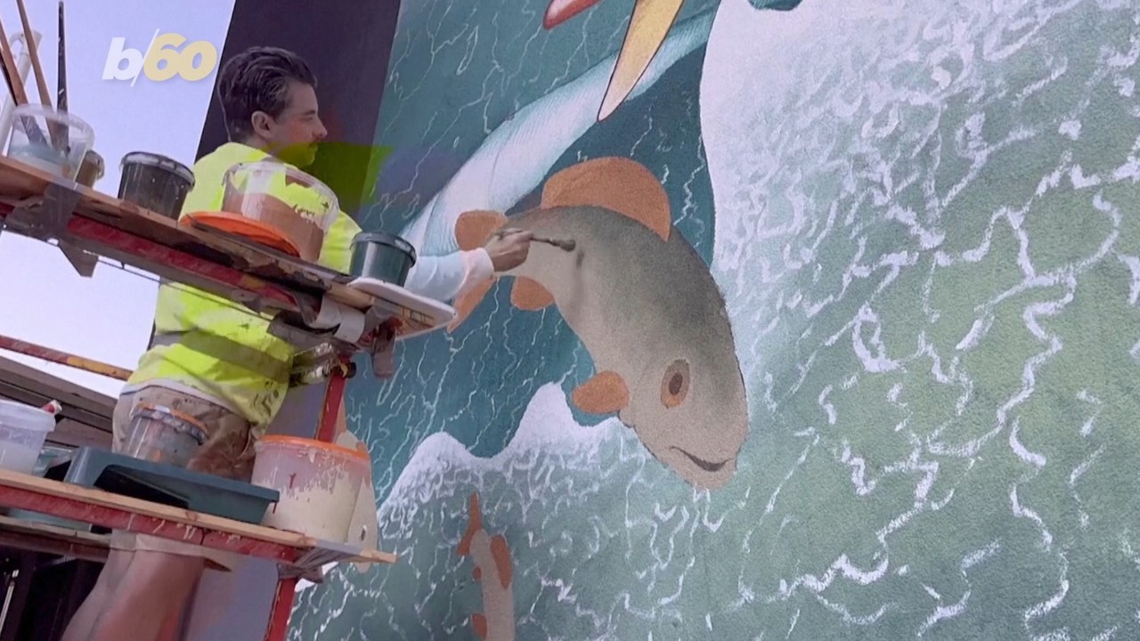 World-Renowned Ukrainian Artist Finds Inspiration In Latest “Time for Change” Mural