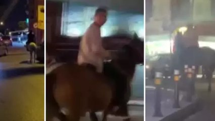 Küçükçekmece’de ilginç görüntü... Cadde ortasında trafikte atla gezdi